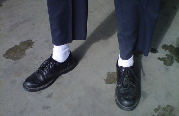 wearing white socks with black shoes